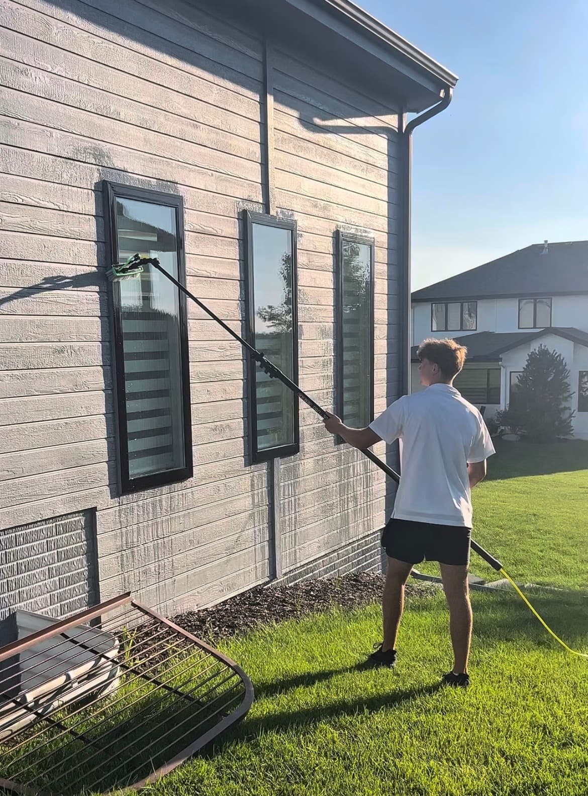 Sparkling clean exterior windows after pure water treatment